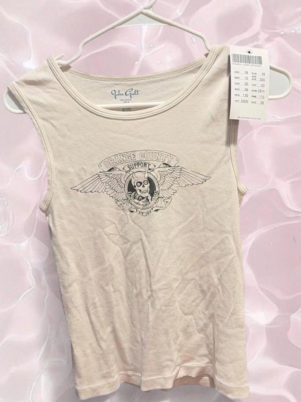 Brandy Melville Cream Graphic Tank Top with Skull Wing Print